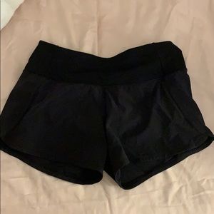 SIZE 2 BLACK LULULEMON SHORTS 4”